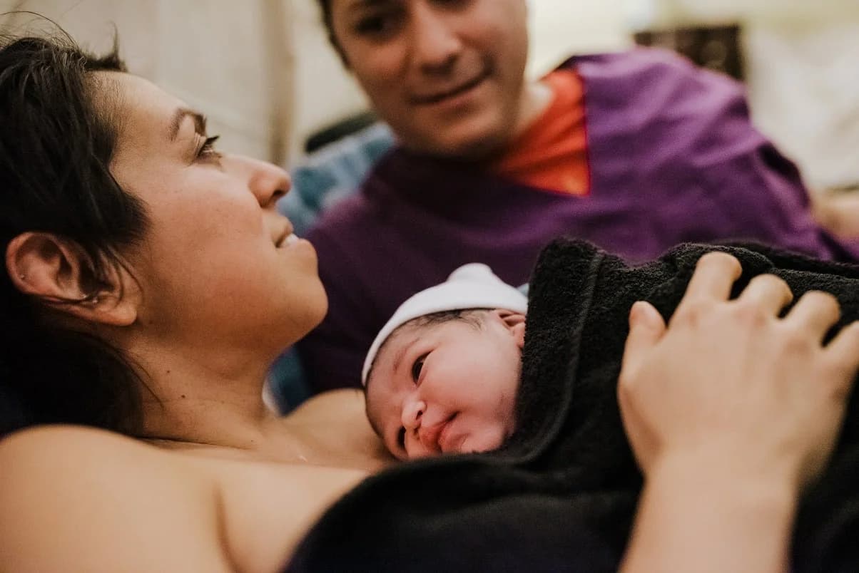 Powerful grace embodied — a mother preparing for sacred work