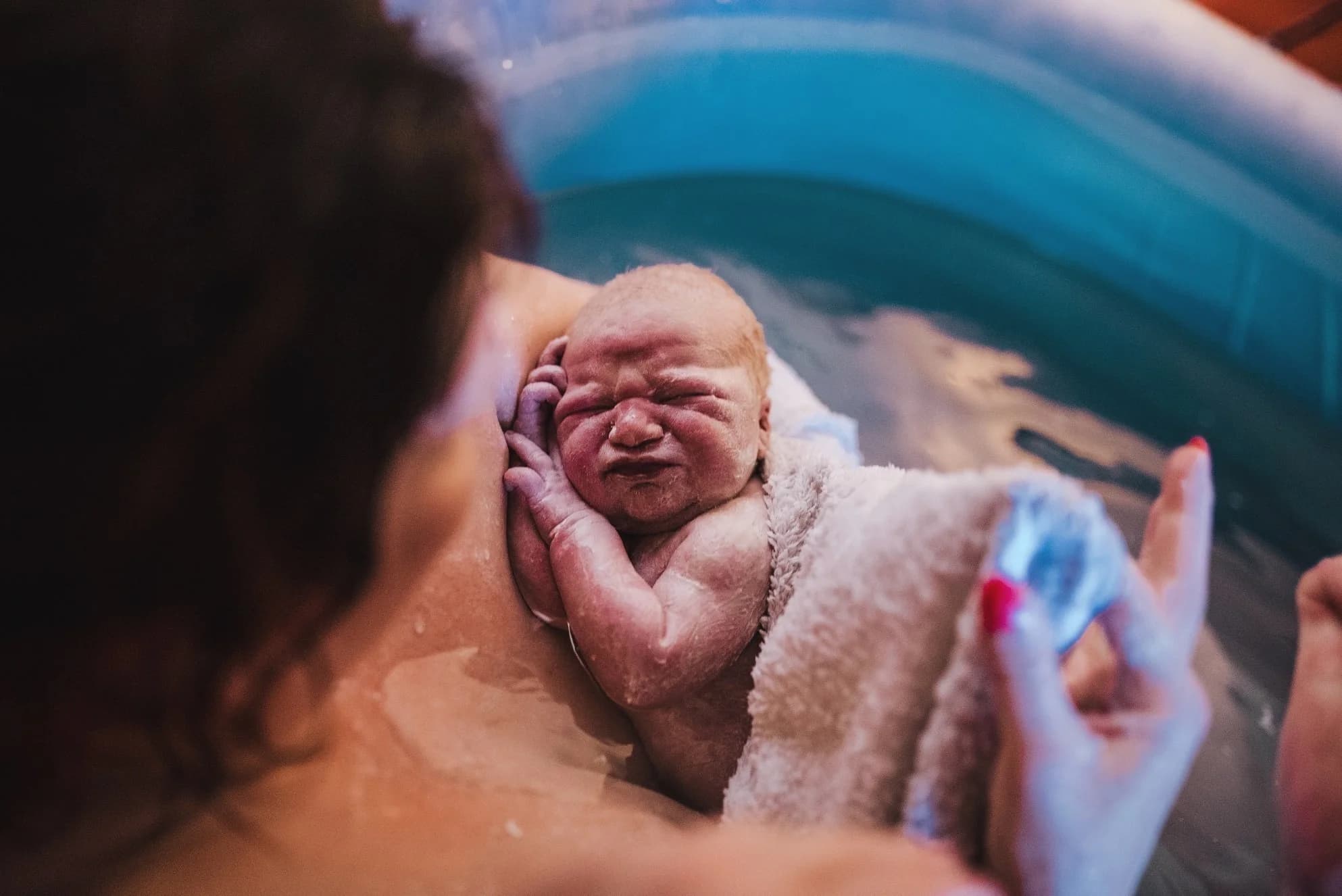 Baby placed on mother's chest for the first time